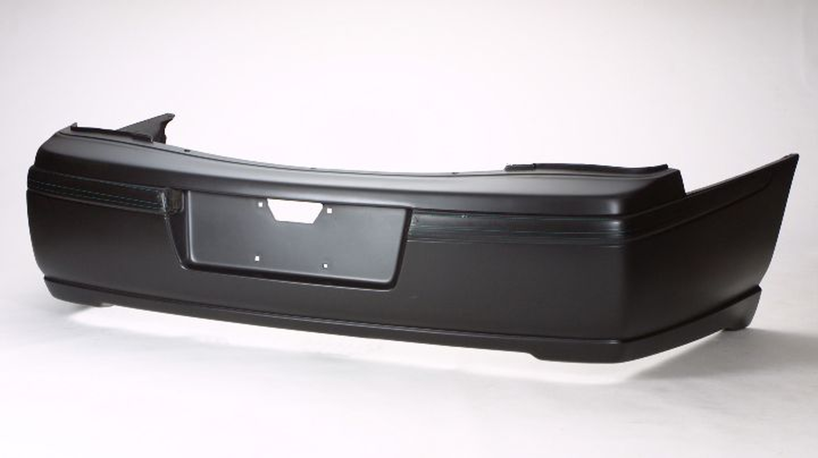 GM1100579 chevrolet impala 2002 2005 bumper rear primed with textured moulding gm1100579 1
