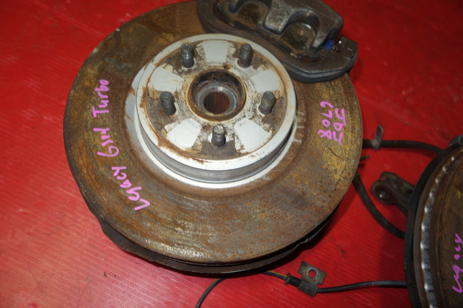 JDM Subaru Legacy / Outback Front Spindle Hub Knuckle Caliper 2005-2009
