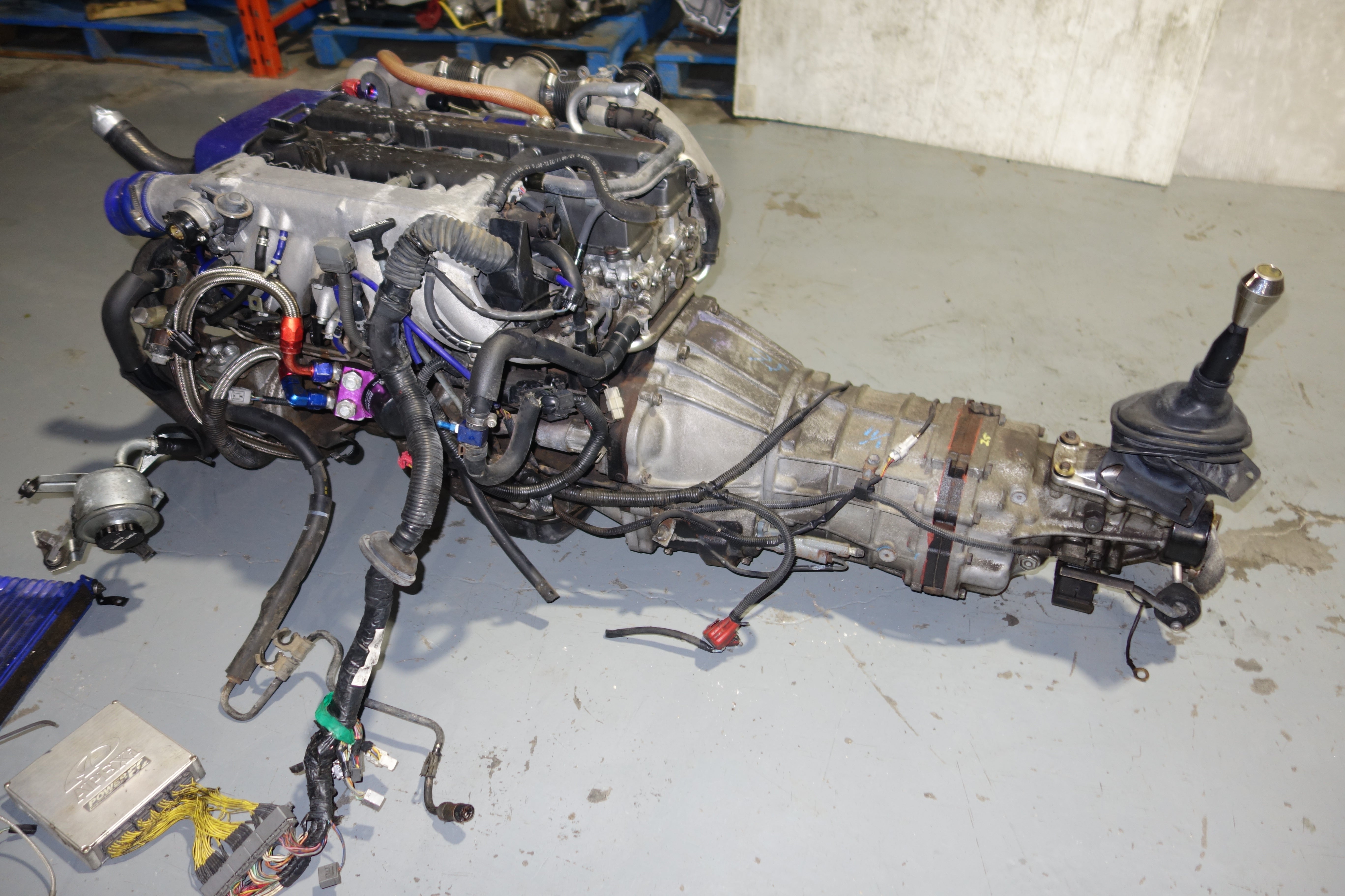 JDM Toyota Supra 1990-1993 1JZ-GTE Non-VVTi 2.5L Twin Turbo Engine & R154 5-Speed Manual Transmission Swap with Apexi Power FC ECU, Wiring Harness & Greddy Electronics