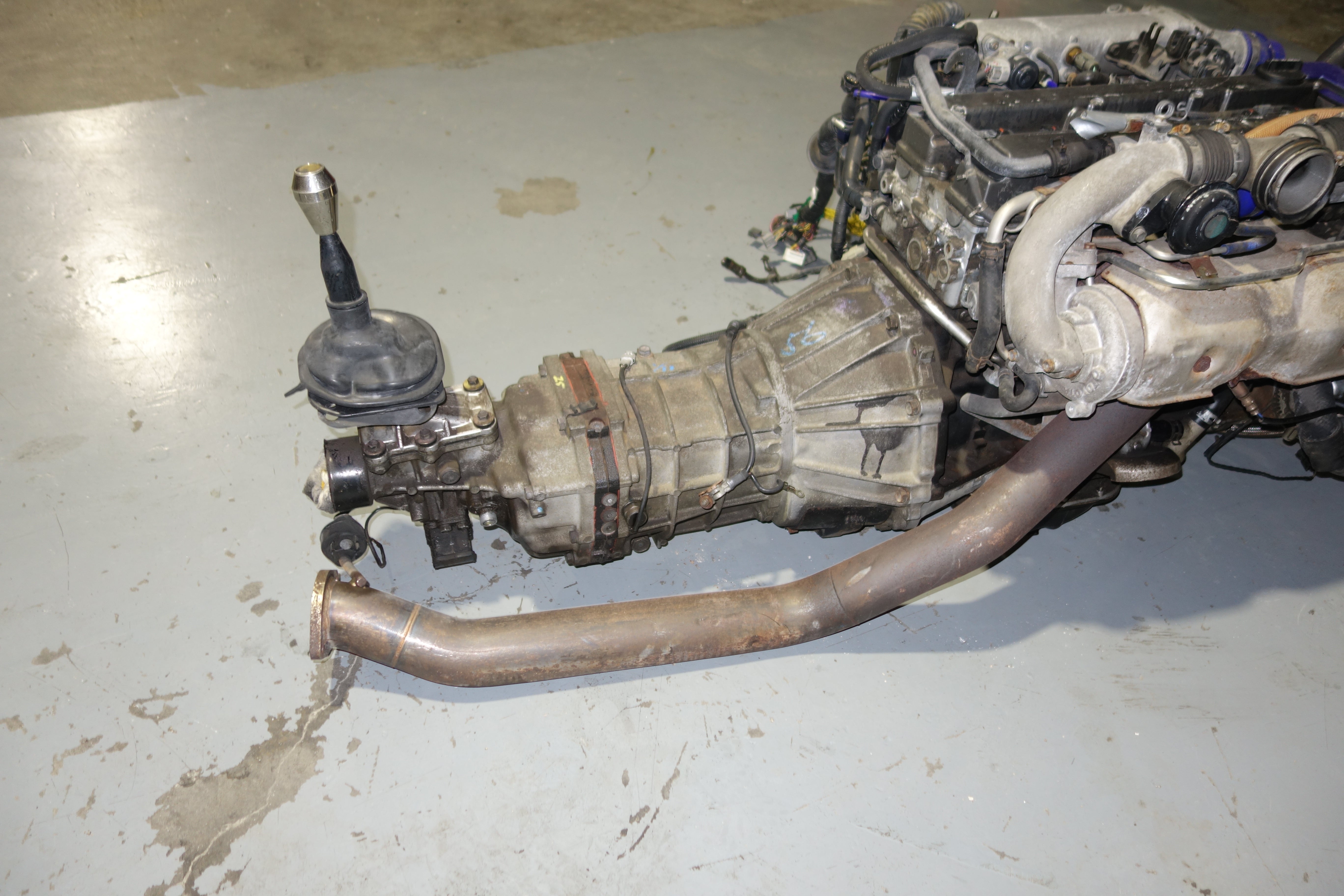 JDM Toyota Supra 1990-1993 1JZ-GTE Non-VVTi 2.5L Twin Turbo Engine & R154 5-Speed Manual Transmission Swap with Apexi Power FC ECU, Wiring Harness & Greddy Electronics