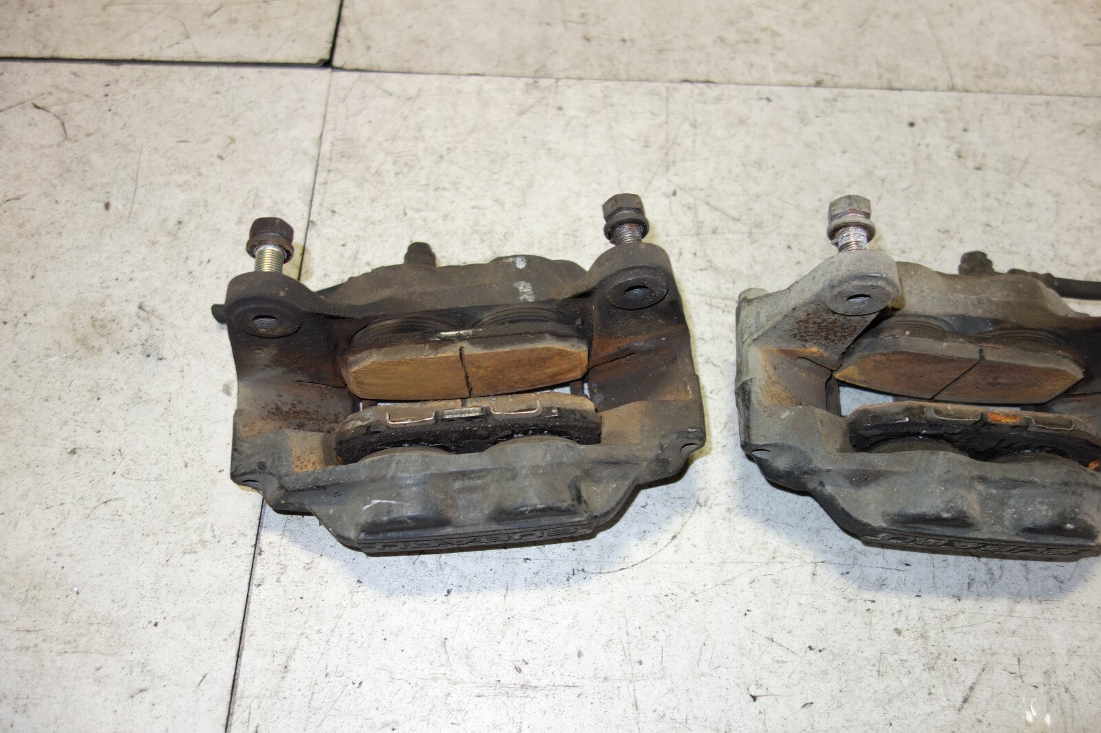 JDM SUBARU IMPREZA WRX STI OEM FRONT 4 POT BRAKE CALIPER PISTON LEAGACY FORESTER