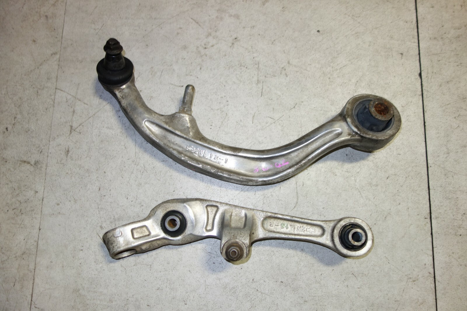 JDM Nissan 350z / G35 OEM Front Lower Control Arm Pair Rearward Forward LH 03-09